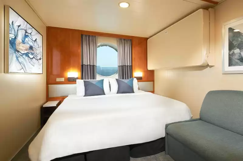 Cabine extérieure avec un grand hublot